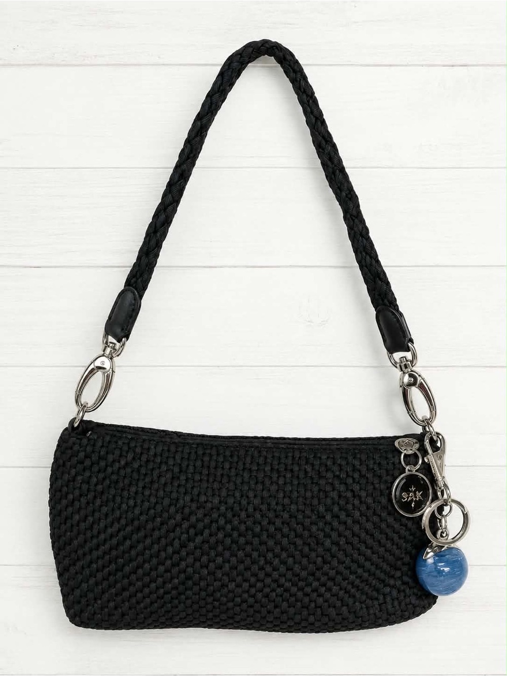 The Sak Black Woven Shoulder Bag with Blue Charm
